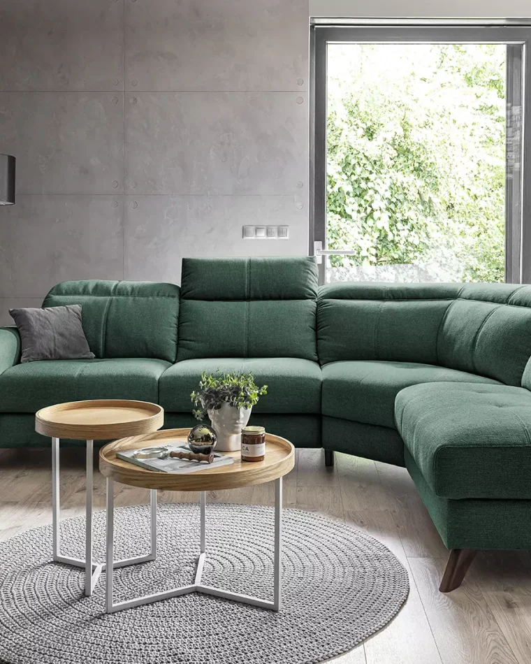 How to style a dark green velvet sofa for a luxurious living room