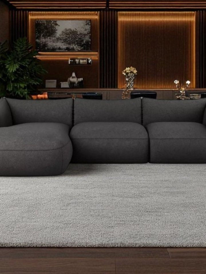 Make a statement with the timeless edge of a black corner sofa